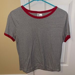 Crop top, black and white striped, red collar.